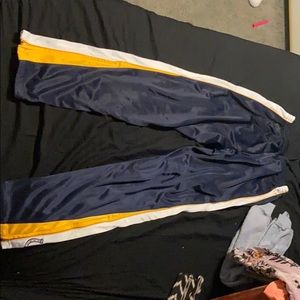 Blue and gold track pants